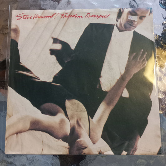 Stevie Winwood Freedom Overspill Simple 7" 2da. Mano Usado Muy Bien + VG+