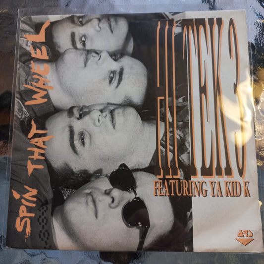 Hi Tek 3 Spin That Wheel Simple 7" 2da. Mano VG+