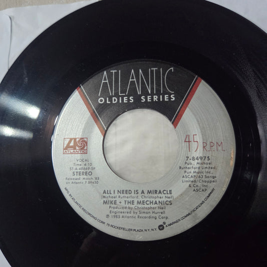 Mike and the Mechanics All I need is a Miracle Simple 7" 2da. Mano VG+